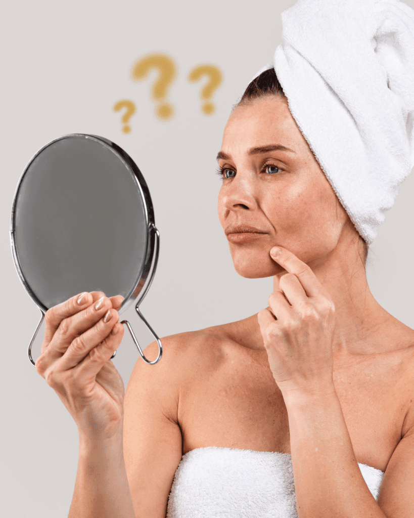 woman looking in mirror
